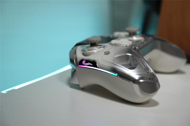 电视怎么连手机游戏手柄_用手柄玩的电视游戏_电视游戏手机手柄软件